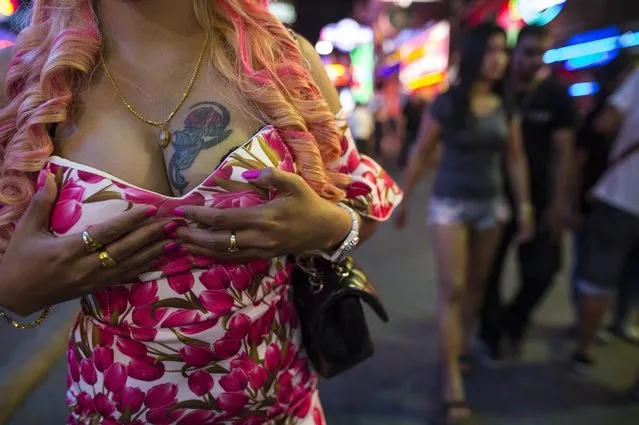 A Thai prostitute shows off her product July 30, 2016 in Pattaya, Thailand. (Photo by Paula Bronstein/Getty Images)