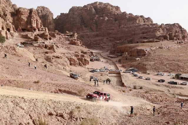 A driver competes during Rally Jameel, an off-road all-female navigation rally, in Petra on April 22, 2025. (Photo by Khalil Mazraawi/AFP Photo)