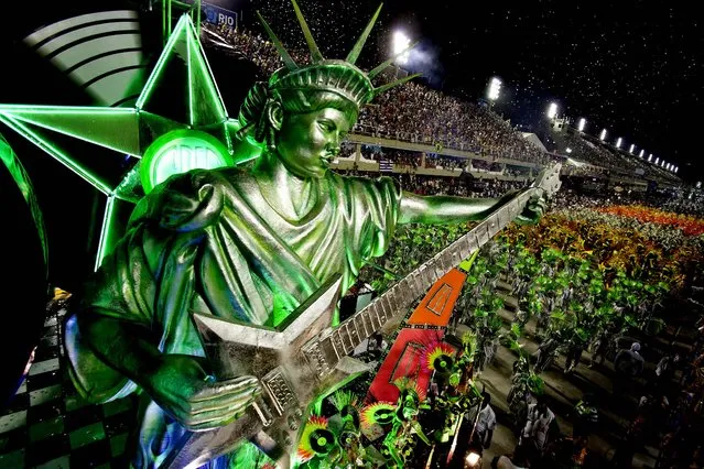 Performers from the Mocidade Independente de Padre Miguel samba school parade at the Sambadrome in Rio de Janeiro.  (Photo by Felipe Dana/Associated Press)