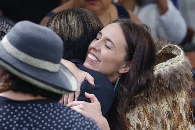 New Zealand Prime Minister Jacinda Ardern receives a hug during Rātana Celebrations on January 24, 2023 in Whanganui, New Zealand. The 2023 Rātana Celebrations mark the last day as Prime Minister for Jacinda Ardern following her resignation on January 19. Labour MP Chris Hipkins became the sole nominee for her replacement and will be sworn in as the new Prime Minister at a ceremony on January 25. (Photo by Hagen Hopkins/Getty Images)
