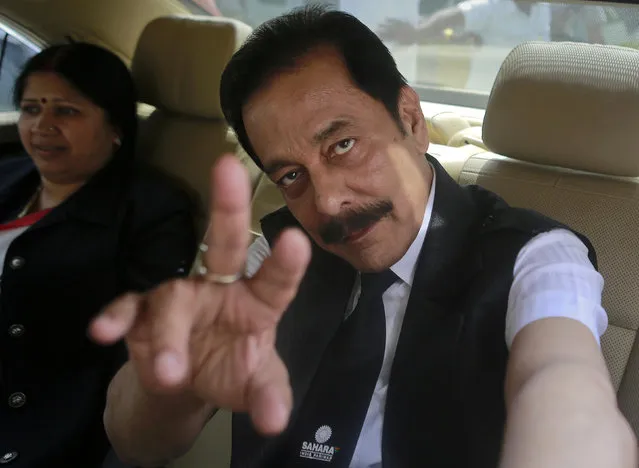 Sahara Group Chairman Subrata Roy gestures as he arrives at the Securities and Exchange Board of India (SEBI) headquarters in Mumbai April 10, 2013. (Photo by Danish Siddiqui/Reuters)