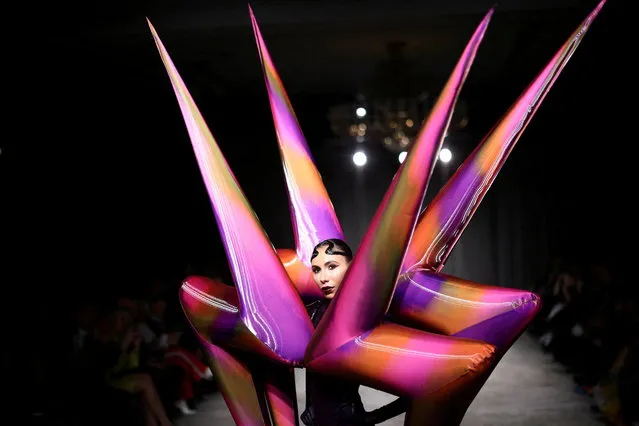 A model presents a creation during the “On/Off presents Jack Irving” catwalk show at London Fashion Week in London, Britain on February 18, 2022. (Photo by Henry Nicholls/Reuters)