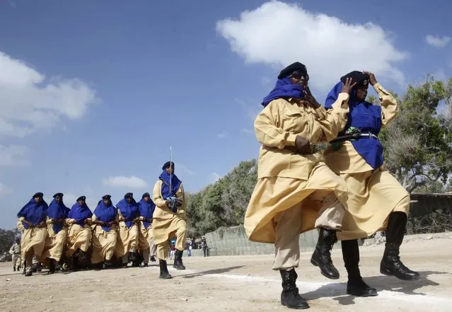 Somali policewomen march in a passing out parade during celebrations to mark the Somali Police Force's 71st founding anniversary in the capital Mogadishu December 20, 2014. (Photo by Ismail Taxta/Reuters)