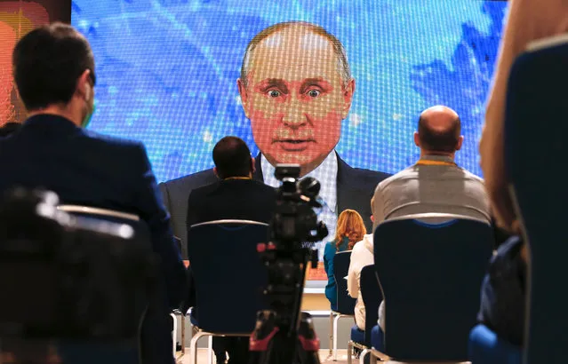 Russian President Vladimir Putin speaks via video call during a news conference in Moscow, Russia, Thursday, December 17, 2020. This year, Putin attended his annual news conference online due to the coronavirus pandemic. (Photo by Alexander Zemlianichenko/AP Photo)
