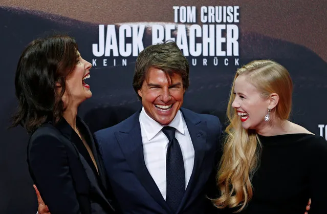 Actors Cobie Smulders, Danika Yarosh and Tom Cruise arrive for the German premiere of the film “Jack Reacher: Never Go Back” in Berlin, Germany, October 21, 2016. (Photo by Hannibal Hanschke/Reuters)
