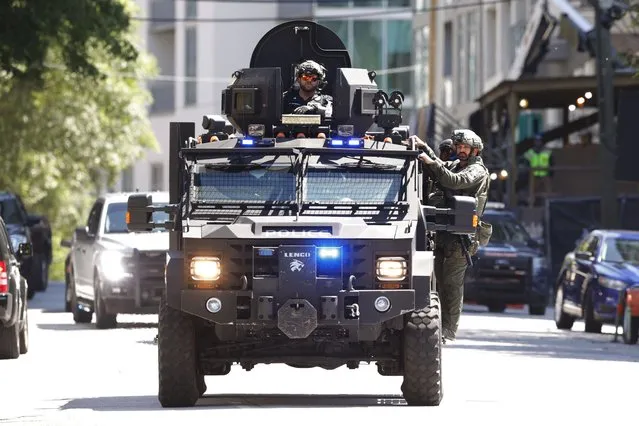 Law enforcement officers arrive near the scene of an active shooter on Wednesday, May 3, 2023 in Atlanta. (Photo by Alex Slitz/AP Photo)