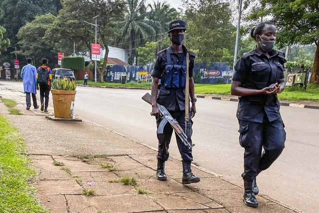 Security forces patrol in Kampala, Uganda Wednesday, January 13, 2021.The United States ambassador to Uganda said Wednesday the embassy has canceled plans to observe the country's tense presidential election on Thursday, citing a decision by electoral authorities to deny accreditation to most members of the observation team. (Photo by Jerome Delay/AP Photo)