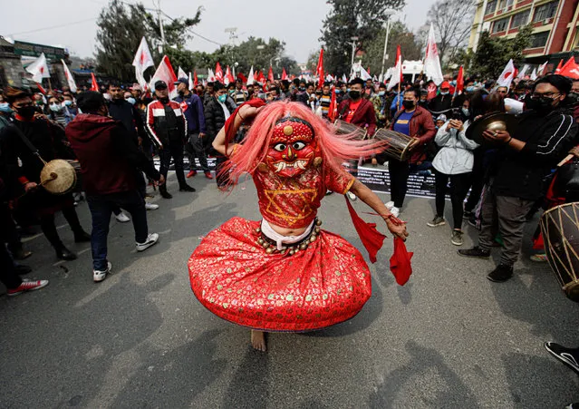 A supporter of a faction of the ruling Nepal Communist Party dressed as Lakhey (A demon in Nepalese folklore) takes part in a rally during mass gathering against the dissolution of parliament, in Kathmandu, Nepal on February 10, 2021. (Photo by Navesh Chitrakar/Reuters)