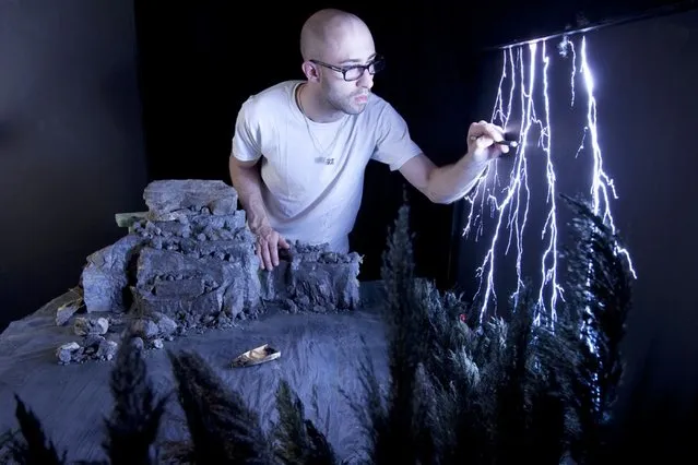 Matthew etches lightening bolts into plexiglass for his model, “Box of Lightening”. (Photo by Matthew Albanese/Barcroft Media)