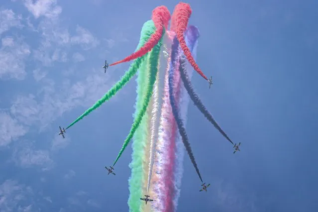 The Fursan Al Emarat aerobatic demonstration team of the United Arab Emirates Air Force perform during an aerial display at the Langkawi International Maritime and Aerospace Exhibition 2023 (LIMA '23) on May 23, 2023 in Langkawi, Malaysia. After a four-year hiatus, the Langkawi International Maritime and Aerospace Exhibition is set with its 16th edition. It is one of the largest maritime and aerospace exhibitions in the Asia-Pacific targeting the growth markets from the defence, enforcement, civil and commercial sectors in both the maritime and aviation industries. (Photo by Annice Lyn/Getty Images)