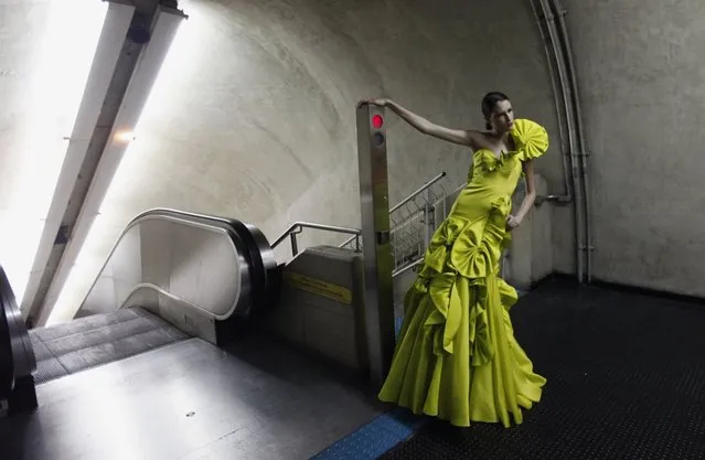 A model presents a creation in a subway station during the Sao Paulo Fashion Week in Sao Paulo October 27, 2013. (Photo by Paulo Whitaker/Reuters)