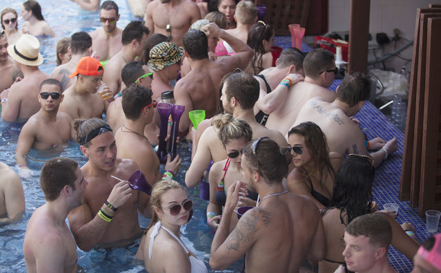 Spring breakers gather at a pool party at a hotel in Cancun March 14, 2015. (Photo by Victor Ruiz Garcia/Reuters)