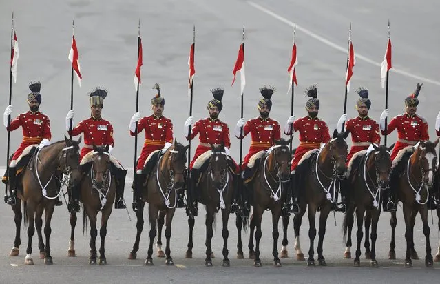The Indian President's bodyguards, mounted on their horses, take part during the full dress rehearsal for the “Beating the Retreat” ceremony in New Delhi, India, January 28, 2016. (Photo by Altaf Hussain/Reuters)
