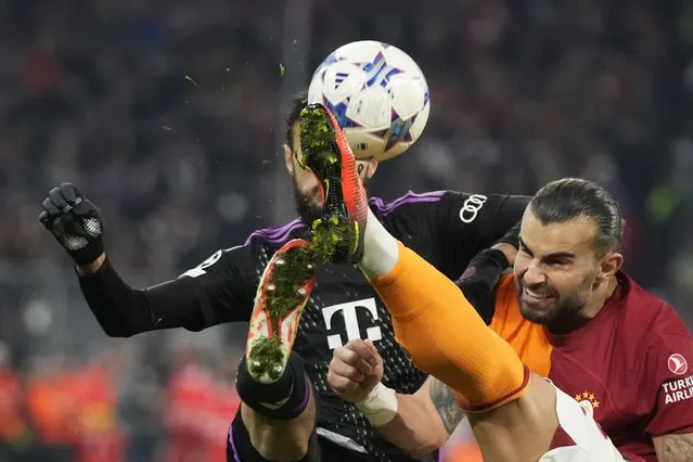 Bayern's Noussair Mazraoui, left, and Galatasaray's Abdulkerim Bardakci challenge for the ball during the Champions League group A soccer match between Bayer Munich and Galatasaray at the Allianz Arena stadium in Munich, Germany, Wednesday, November 8, 2023. (Photo by Matthias Schrader/AP Photo)