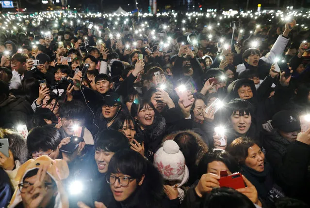 People attend a ceremony to celebrate the new year in Seoul, South Korea, January 1, 2019. (Photo by Kim Hong-Ji/Reuters)