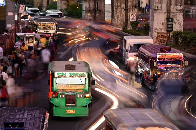 This picture taken on January 18, 2019 shows jeepneys during rush hour in Manila, Philippines. (Photo by Noel Celis/AFP Photo)