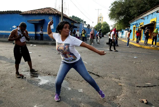 Demonstrators clash with security forces in Urena, Venezuela, February 23, 2019. (Photo by Andres Martinez Casares/Reuters)