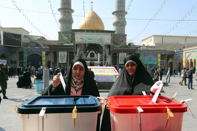 Veiled Iranian women cast their votes during the Iranian legislative election at the Abdol-Azim shrine in Shahre-Ray, southern Tehran, Iran, 01 March 2024. (Photo by Abedin Taherkenareh/EPA/EFE)