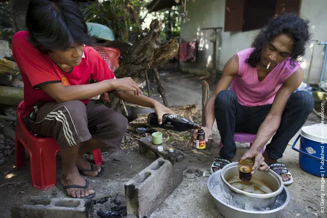 Thai Malay Muslim user mixes coke into 4 x 100, the popular cheap narcotic drink