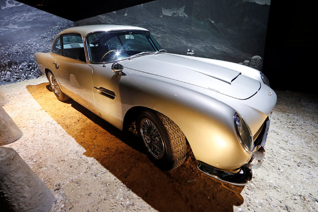 An Aston Martin DB5 from the James Bond film Goldfinger is displayed during a press presentation of the exhibition “The Designing 007: Fifty Years of Bond Style” at the Grande Halle de la Villette in Paris, France, April 13, 2016. (Photo by Benoit Tessier/Reuters)