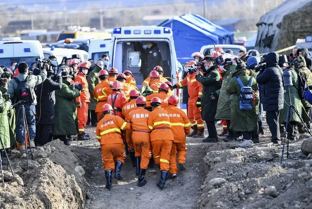 In this photo released by China's Xinhua News Agency, rescuers work at the site of a flooded coal mine in Xiaoyi city in northwestern China's Shanxi Province, Friday, December 17, 2021. Crews have safely rescued 20 of 21 Chinese coal miners trapped inside a flooded shaft, with one still missing. (Photo by Cao Yang/Xinhua via AP Photo)