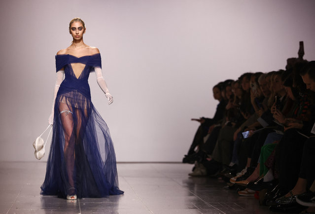 A model presents a creation by Ukrainian designer Ivan Frolov during the “Ukraine Fashion Week presents: FROLOV, KSENIASCHNAIDER, PASKAL” show during London Fashion Week in London, Britain on February 21, 2023. (Photo by Henry Nicholls/Reuters)