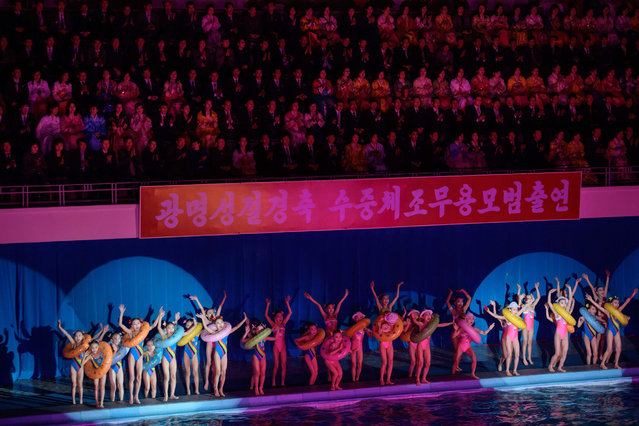 Swimmers perform in a synchronised swimming gala event celebrating late North Korean leader Kim Jong Il, in Pyongyang on February 14, 2019. (Photo by Ed Jones/AFP Photo)