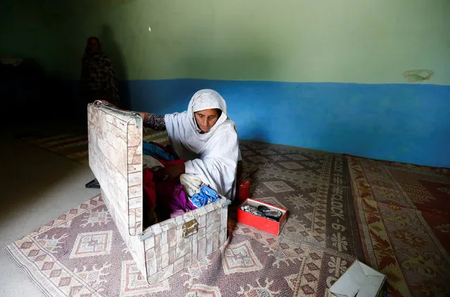 Shehreen, aunt of Ambreen Riasat, shows her belongings in their home in the village of Makol outside Abbottabad, Pakistan May 6, 2016. (Photo by Caren Firouz/Reuters)