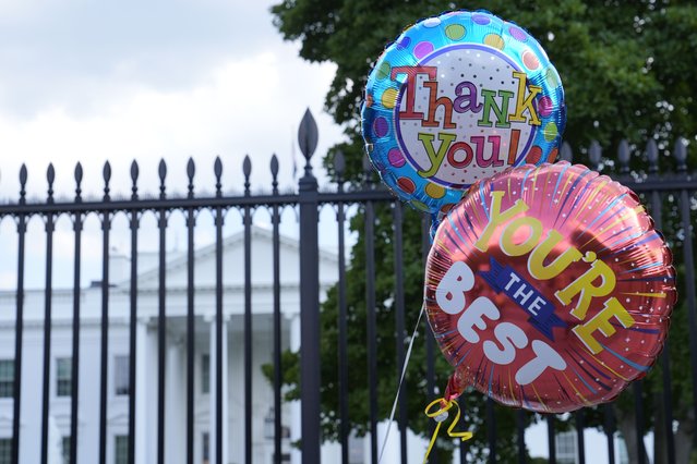 Balloons for President Joe Biden are brought to the White House in Washington, Sunday, July 21, 2024. Biden dropped out of the 2024 race for the White House on Sunday, ending his bid for reelection following a disastrous debate with Donald Trump that raised doubts about his fitness for office just four months before the election. (Photo by Susan Walsh/AP Photo)