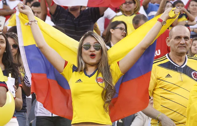 A fan of Colombia cheers her team on during a Quarterfinal match between Colombia and Peru at MetLife Stadium as part of Copa America Centenario US 2016 on June 17, 2016 in East Rutherford, New Jersey, US. Colombia won the 0-0 game by penalty kicks. (Photo by Chris Szagola/LatinContent/Getty Images)