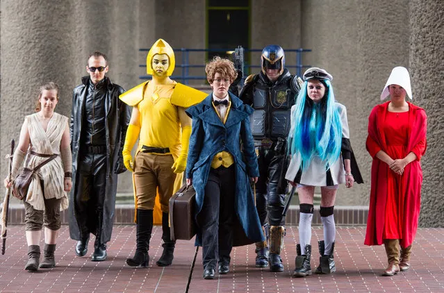 (L-R) Science fiction fans, cosplayers and aficionados Eleanor Jane Stringer, Scott Simmons, Alex Chapman, Chloe Stockwell, William Conley, Carrie Baird and Mai Fox celebrate the final month of “Into The Unknown: A Journey Through Science Fiction” exhibition at Barbican Centre on August 2, 2017 in London, England. (Photo by Jeff Spicer/Getty Images)