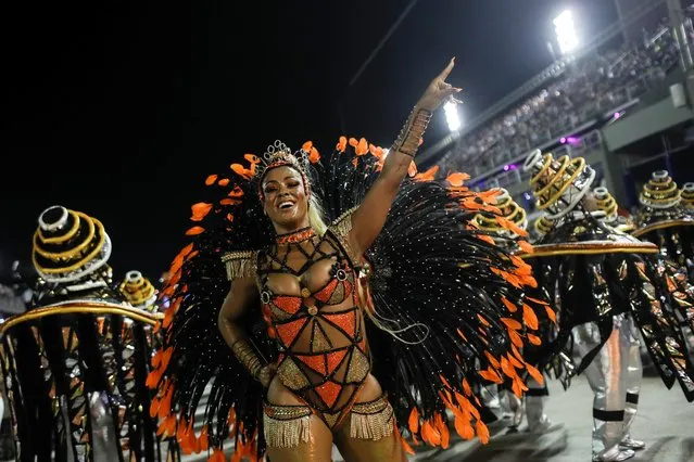 A reveller of Estacio de Sa samba school performs during the first night of the Carnival parade at the Sambadrome in Rio de Janeiro, Brazil on February 23, 2020. (Photo by Ricardo Moraes/Reuters)