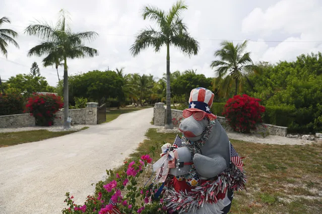 A mailbox in the shape of a manatee decorated with American flags and lipstick is seen along the highway US-1 in the Lower Keys near Tavernier in Florida, July 10, 2014. (Photo by Wolfgang Rattay/Reuters)