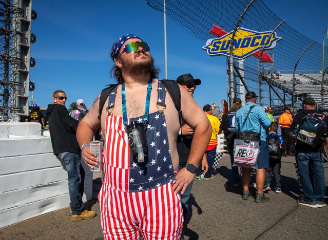 A star-spangled spectator takes in a perfect Sunday afternoon, November 3, 2024 for stock-car racing. About 50,000 fans turned up for Sunday afternoon’s Xfinity 500 at Martinsville Speedway in Ridgeway, Virginia. (Photo by Lauren Caulk/The Guardian)