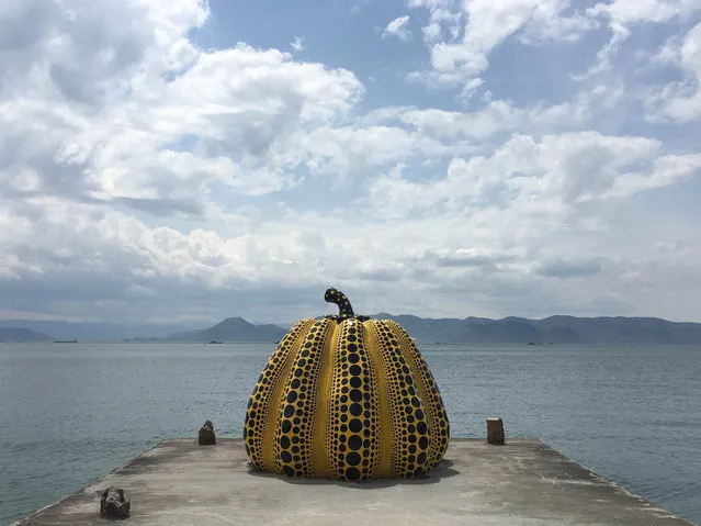 A sculpture by the renowned Japanese artist Yayoi Kusama on the Naoshima island, Japan on September 3, 2017. In recent decades Kusama has become world-famous for her artistic universe of radiantly coloured, riotously spreading patterns that cover the surfaces of paintings and sculptures and extend into all-encompassing installations where whole rooms, walls, floors and ceilings are covered in soft forms and dots starkly contrasting in black and yellow or white and red. (Photo by Belinda Merhab/AAP)
