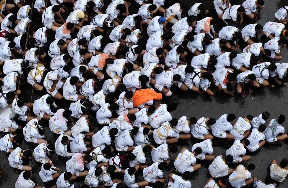 A Human Pyramid of Devotion