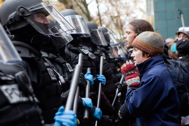 A protester pleads with police during a demonstration near the Occupy Portland encampment November 13, 2011 in Portland, Oregon. (Photo by Natalie Behring/Getty Images)