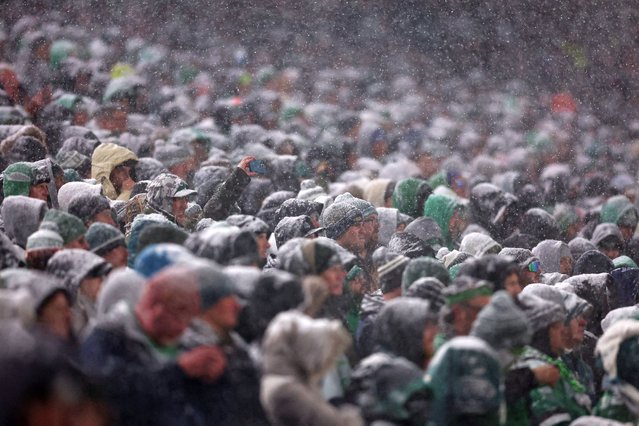 Fans bear a chilly day in the stands during a National Football Conference game between the Los Angeles Rams and the Philadelphia Eagles at Lincoln Financial Field in Philadelphia on January 19, 2025. (Photo by Bill Streicher/Reuters)