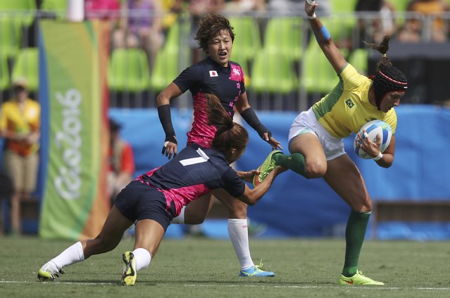 2016 Rio Olympics, Rugby, Preliminary, Women's Pool C Brazil vs Japan, Deodoro Stadium, Rio de Janeiro, Brazil on August 7, 2016. Haline Leme Scatrut (BRA) of Brazil is tackled by Marie Yamaguchi (JPN) of Japan. (Photo by Phil Noble/Reuters)