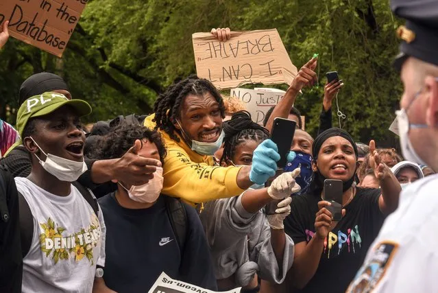 Protesters clash with police during a rally against the death of Minneapolis, Minnesota man George Floyd at the hands of police on May 28, 2020 in Union Square in New York City. Floyd's death was captured in video that went viral of the incident. Minnesota Gov. Tim Walz called in the National Guard today as looting broke out in St. Paul. (Photo by Stephanie Keith/Getty Images)