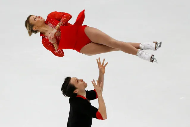 Kirsten Moore- Towers, top, and Michael Marinaro of Canada compete in the Pairs Short Program during the Audi Cup of China ISU Grand Prix of Figure Skating 2017 at the Capital Gymnasium in Beijing, Friday, November 3, 2017. (Photo by Thomas Peter/Reuters)