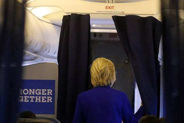 U.S. Democratic presidential candidate Hillary Clinton walks inside of her campaign plane as she flies back to White Plains, U.S. September 21, 2016. (Photo by Carlos Barria/Reuters)