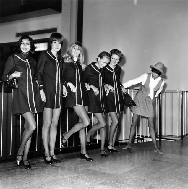 English fashion designer Mary Quant (R) with a group of models at Heathrow Airport, before leaving for a continental fashion tour, 18th March 1968. (Photo by Express/Getty Images)