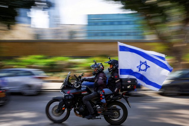 Riders participate in “Ride for Hope”, an event where people ride motorcycles across the country in support of hostages kidnapped in the deadly October 7 attack on Israel by the Palestinian Islamist group Hamas from Gaza, as the conflict between Israel and Hamas continues, in Tel Aviv, Israel on April 12, 2024. (Photo by Hannah McKay/Reuters)