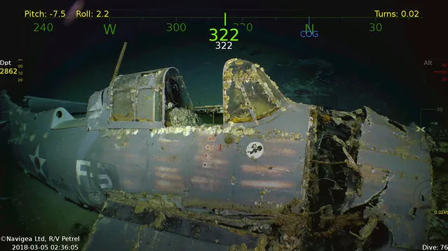 A fighter aircraft is seen in the wreckage of the sunken USS Lexington, a World War Two U.S. Navy aircraft carrier, in this handout image obtained March 6, 2018 courtesy of Paul G. Allen. (Photo by Paul G. Allen/Reuters)