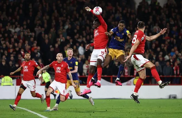 Moussa Niakhate of Nottingham Forest lifts his arm to the ball to give a way a last minute penalty during the Premier League match at the City Ground, Nottingham, UK on March 17, 2023. (Photo by Darren Staples/Sportimage/Alamy Live News)