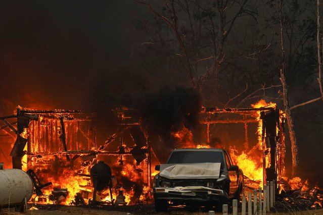 Flames engulf Chinese Camp Town as wildfires rage in Tuolumne County, California, on September 2, 2025. The remote village of Chinese Camp, a town of fewer than 100 residents on the western foothills of the Sierra Nevada in California's Gold Country region, was particularly hard hit by the fire. (Photo by Tracy Barbutes/Reuters)