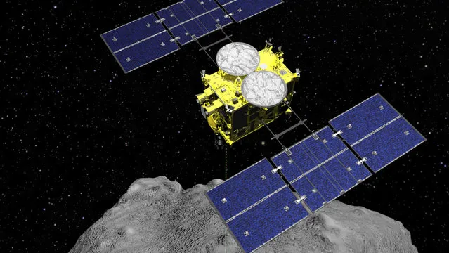 This computer graphics image released by the Japan Aerospace Exploration Agency (JAXA) shows the Hayabusa2 spacecraft above the asteroid Ryugu. The Japanese space agency said Friday they are all set for the spacecraft′s final approach to Earth this weekend to deliver a capsule containing valuable samples of a distant asteroid that could provide clues to the origin of the solar system. (Photo by ISAS/JAXA via AP Photo/File)