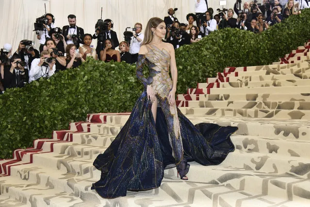 Gigi Hadid attends The Metropolitan Museum of Art's Costume Institute benefit gala celebrating the opening of the Heavenly Bodies: Fashion and the Catholic Imagination exhibition on Monday, May 7, 2018, in New York. (Photo by Charles Sykes/Invision/AP Photo)