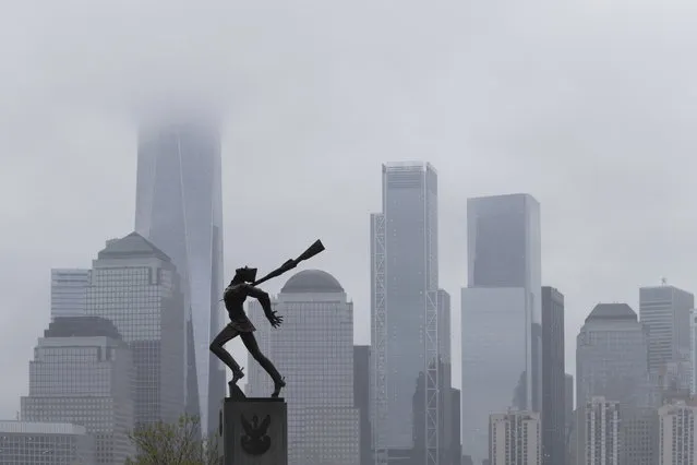 A statue dedicated to the victims of the Katyn massacre of 1940, is seen, Wednesday, May 16, 2018, in Jersey City, N.J. Poland's president met with a New Jersey mayor who stirred controversy recently by making plans to move the statue honoring Polish World War II victims.  (Photo by Mary Altaffer/AP Photo)